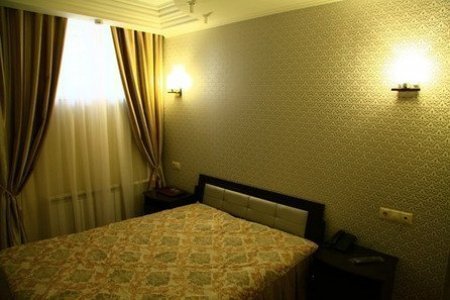 Снять номер для встреч Кроват в номере Стандарт + в отеле Дюна