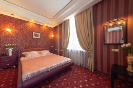 Интерьер в номере Junior Suite в отеле Троя