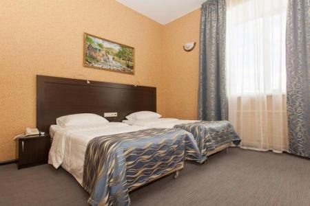 Две кровати в номере Улучшенный в отеле Регина на Университетской