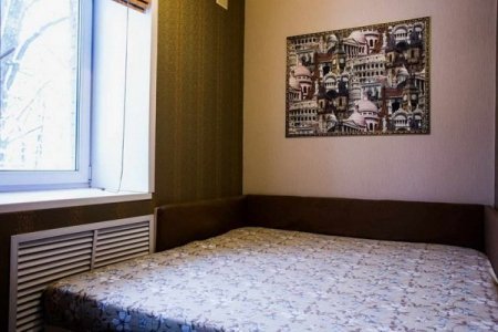 Кровать в номере Двухместный с сауной и джакузи в отеле Мираж