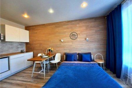 Двуспальная кровать в номере Студио 1 в The LOFT STUDIO Moscow