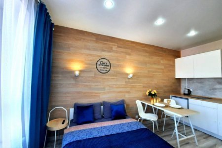 Двуспальная кровать в номере Студио 2 в The LOFT STUDIO Moscow