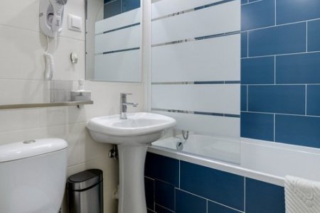 Санузел в номере Улучшенный двухместный в отеле Квадро