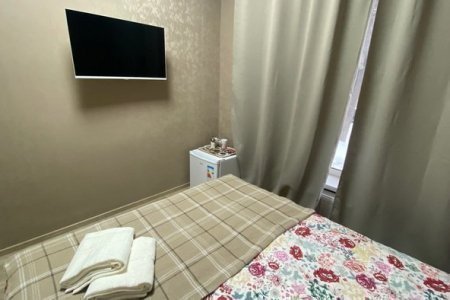 Кровать в номере Эконом в отеле Room Room