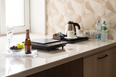Интерьер в номере Студия в отеле Алеон