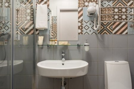 Санузел в номере Сканди в отеле Алеон