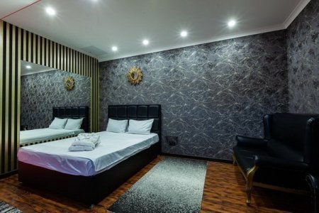 Спальная зона в номере 20 VIP в De Art на Таганской