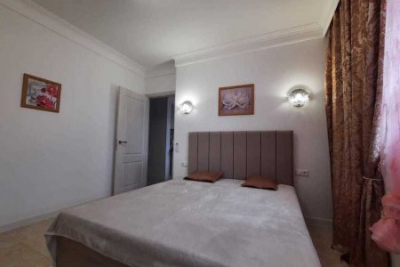 Большая кровать в номере 5 в Loft Studio Носовихинское шоссе