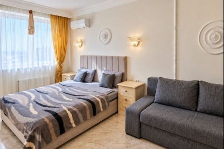 Большая кровать в номере 6 в Loft Studio Носовихинское шоссе