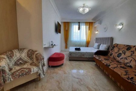 Большая кровать в номере 6 в Loft Studio Носовихинское шоссе
