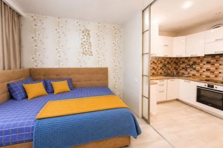Диван в апартаментах 4 в Loft Studio 