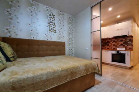 Диван в апартаментах 4 в Loft Studio