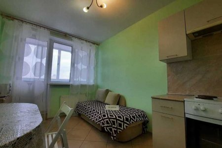 Диван в номере 1 в Loft Studio