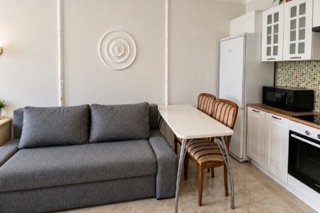 Диван в номере 6 в Loft Studio Носовихинское шоссе