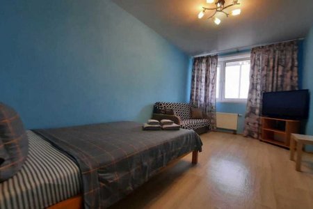 Двуспальная кровать в номере 1 в Loft Studio