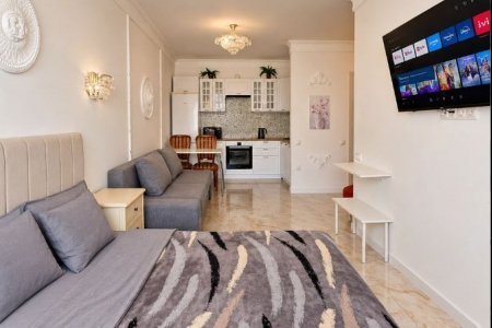 Двуспальная кровать в номере 6 в Loft Studio Носовихинское шоссе