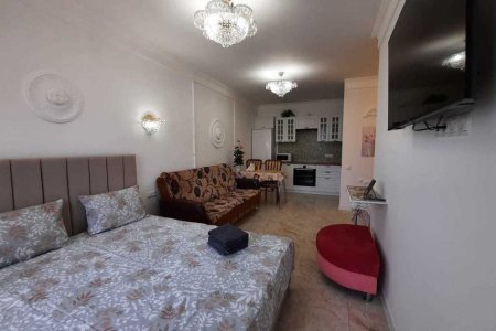 Двуспальная кровать в номере 6 в Loft Studio Носовихинское шоссе