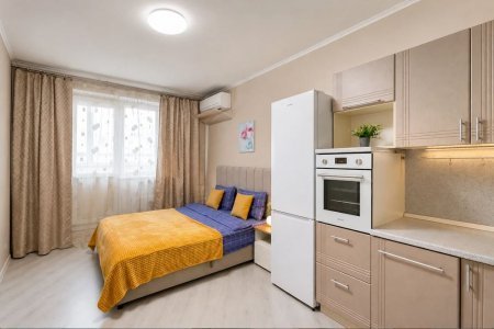 Кровать в апартаментах 3 в Loft Studio