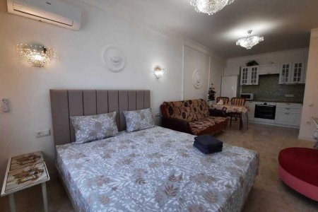 Кровать в номере 6 в Loft Studio Носовихинское шоссе