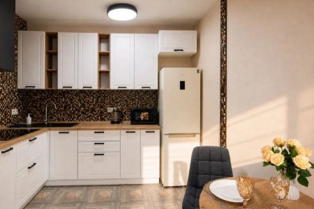 Кухонный уголок в номере 1 в Loft Studio
