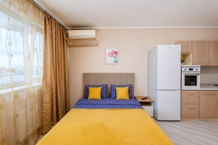 Спальная зона в апартаментах 3 в Loft Studio