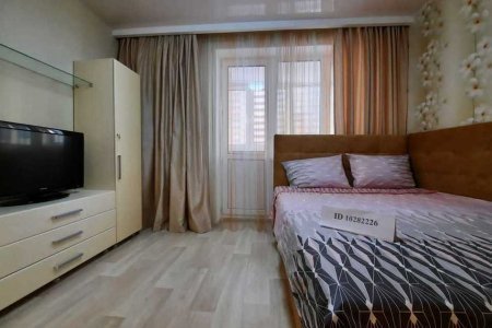 Спальная зона в апартаментах 4 в Loft Studio