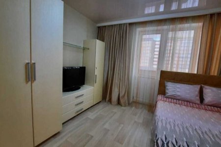 Спальня в апартаментах 4 в Loft Studio