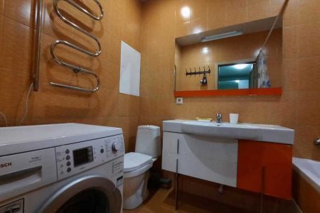 Стиральная машина в номере 1 в Loft Studio