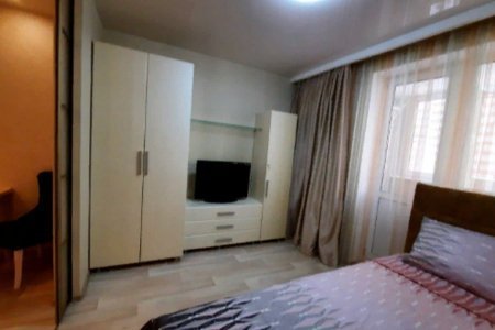Телевизор в апартаментах 4 в Loft Studio