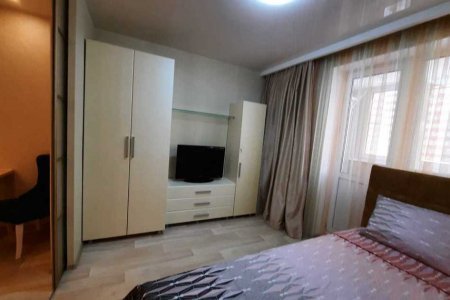 Вид спальни в апартаментах 4 в Loft Studio