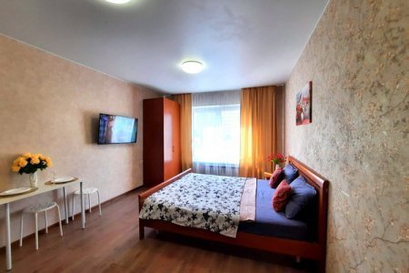 Двуспальная кровать в номере Студия 1 в The LOFT STUDIO MOSCOW