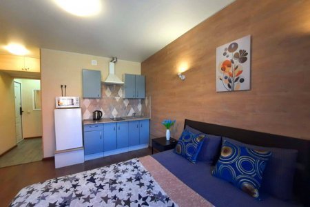 Двуспальная кровать в номере Студия 2 в The LOFT STUDIO MOSCOW