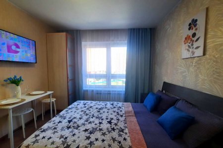 Двуспальная кровать в номере Студия 3 в The LOFT STUDIO MOSCOW