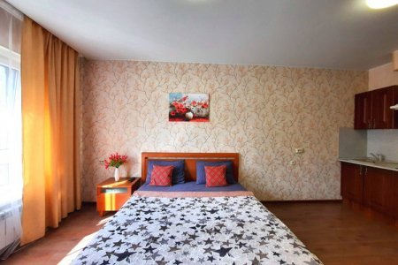 Кровать в номере Студия 1 в The LOFT STUDIO MOSCOW