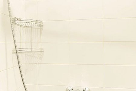 Душ в номере Делюкс в отеле Баунти