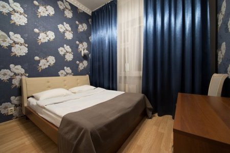 Кровать в номере Стандарт в отеле Лев