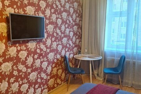Телевизор в номере Комфорт в отеле Лев