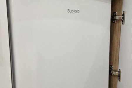 Холодильник в номере Стандарт 5 в отеле Buta Hotel 2