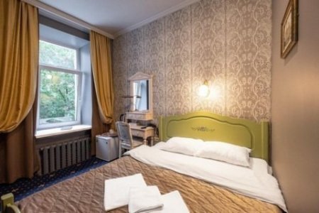 Кровать в номере Стандарт в отеле Чистые пруды