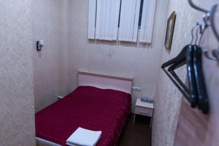 Кровать в номере Стандарт в отеле Автор Братиславская