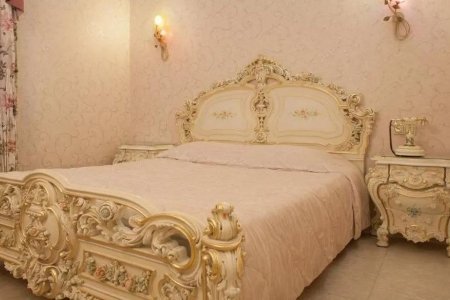 Кровать в номере Делюкс в Брестоле