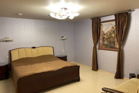 Кровать в номере Эконом в Брестоле