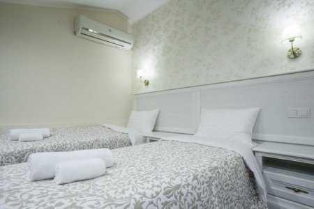 Интерьер номера Стандарт с 2-мя раздельными кроватями в Апельсине на Трубной
