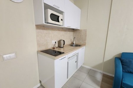 Кухня в номере 5 в The Loft Studio у метро Котельники