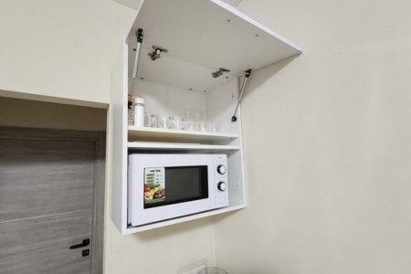 Микроволновая печь в апартаментах 1 в The Loft Studio у метро Котельники