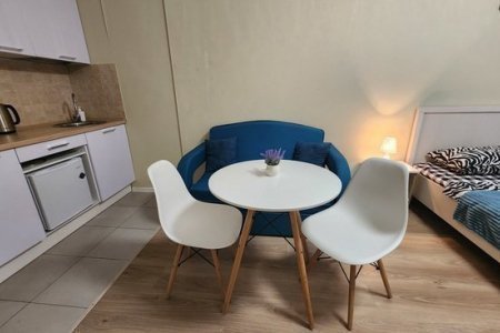 Обеденная зона в номере 5 в The Loft Studio у метро Котельники