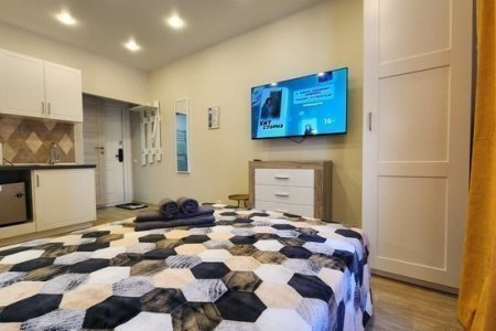 Спальная зона в апартаментах 2 в The Loft Studio у метро Котельники