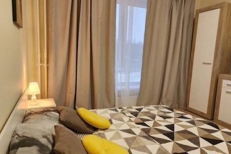 Спальная зона в номере 3 в The Loft Studio у метро Котельники