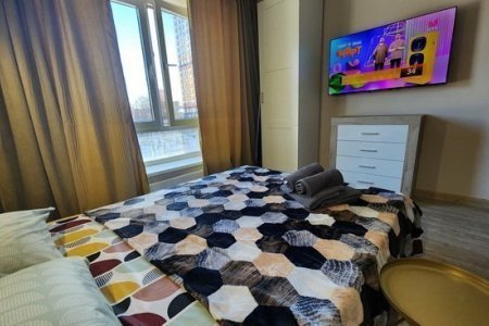 Спальная зона в номере 4 в The Loft Studio у метро Котельники
