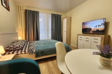 Спальная зона в номере 5 в The Loft Studio у метро Котельники